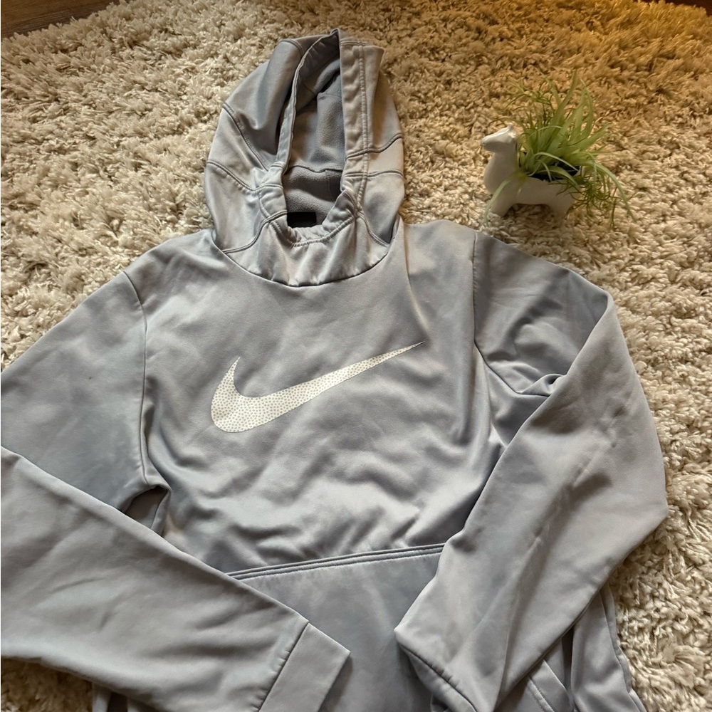 Grey dri fit men’s athletic Nike hoodie with white accents. - Picture 1 of 5